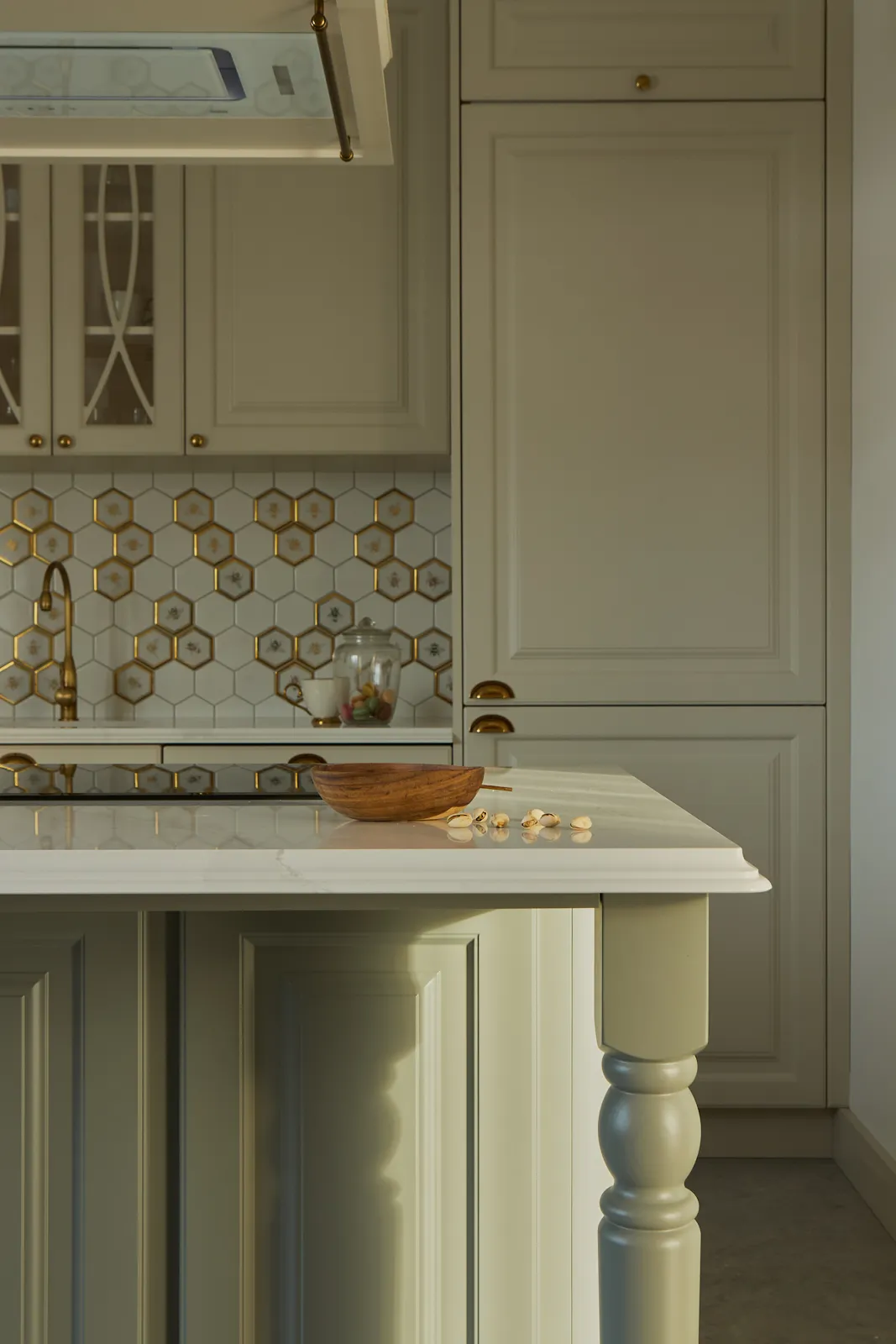 Traditional European kitchen detail with hand-selected brass hardware